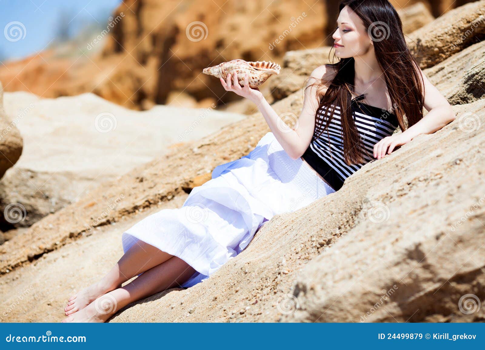 Girl with seashell stock image. Image of blue, lady, girl 24499879
