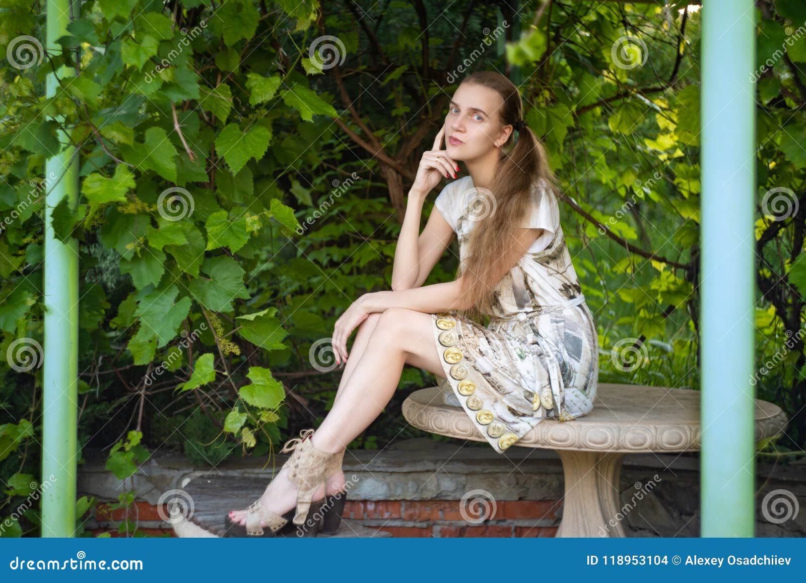 Girl is Seating Near Green Vine Stock Photo - Image of hand, fashion ...