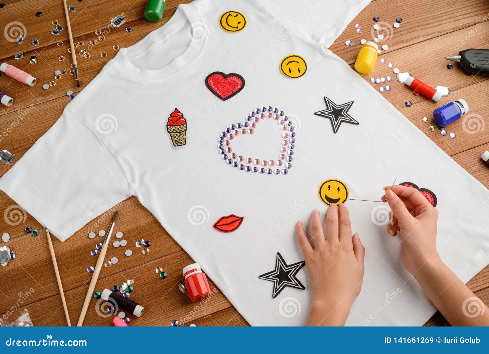 Girl Sewing Patches on T-shirt. Stock Image - Image of creative, hobby:  141661269