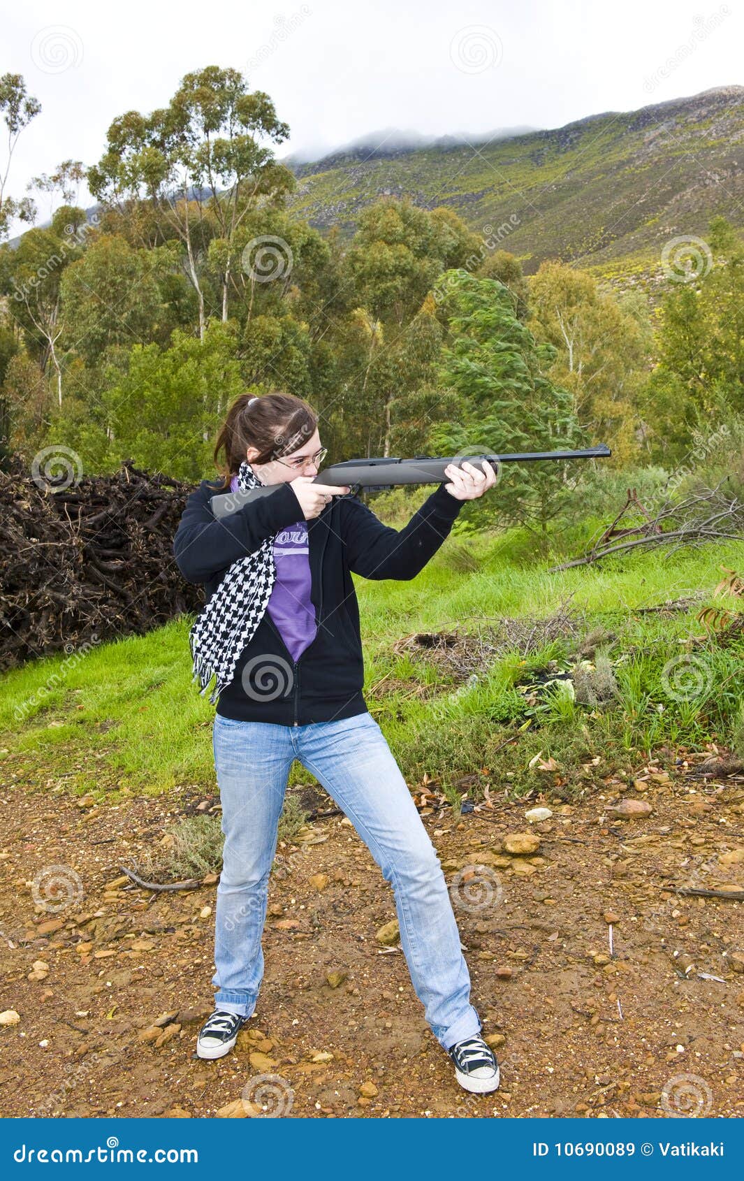 Girl shooting airgun stock image. Image of grass, schoolgirl - 10690089