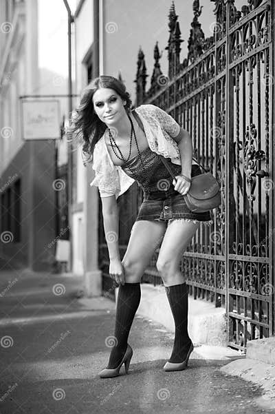 Girl Short Skirt and Bag Walking on Street.Young European Girl in Urban ...