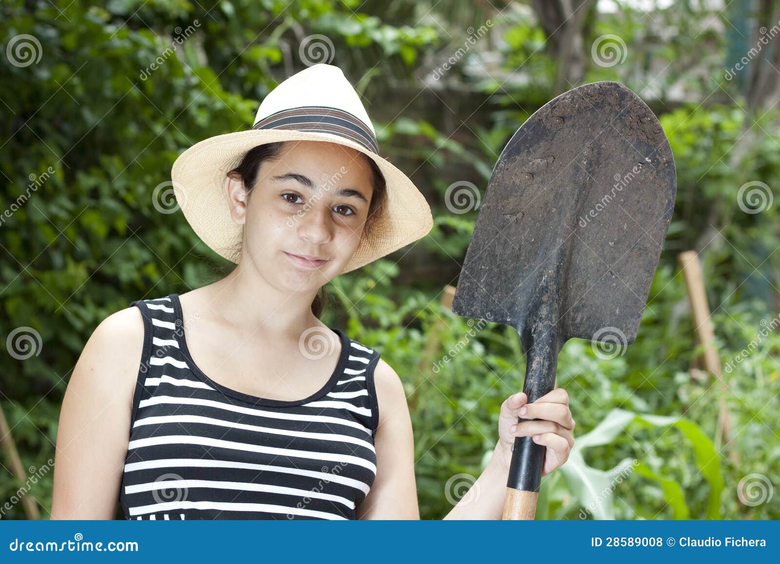 Girl with a shovel stock photo. Image of casual, face 28589008