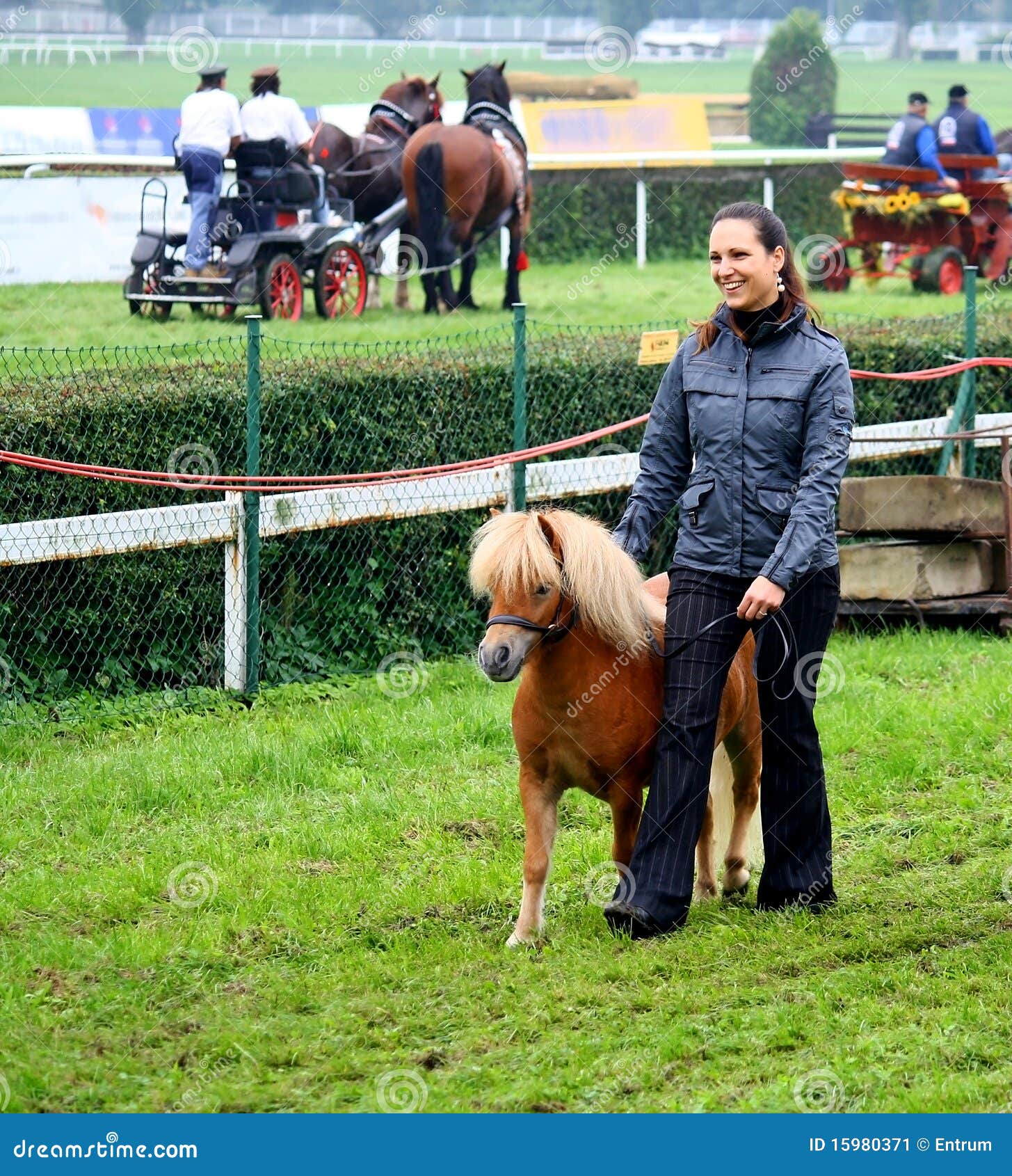 girl showing a mini pony