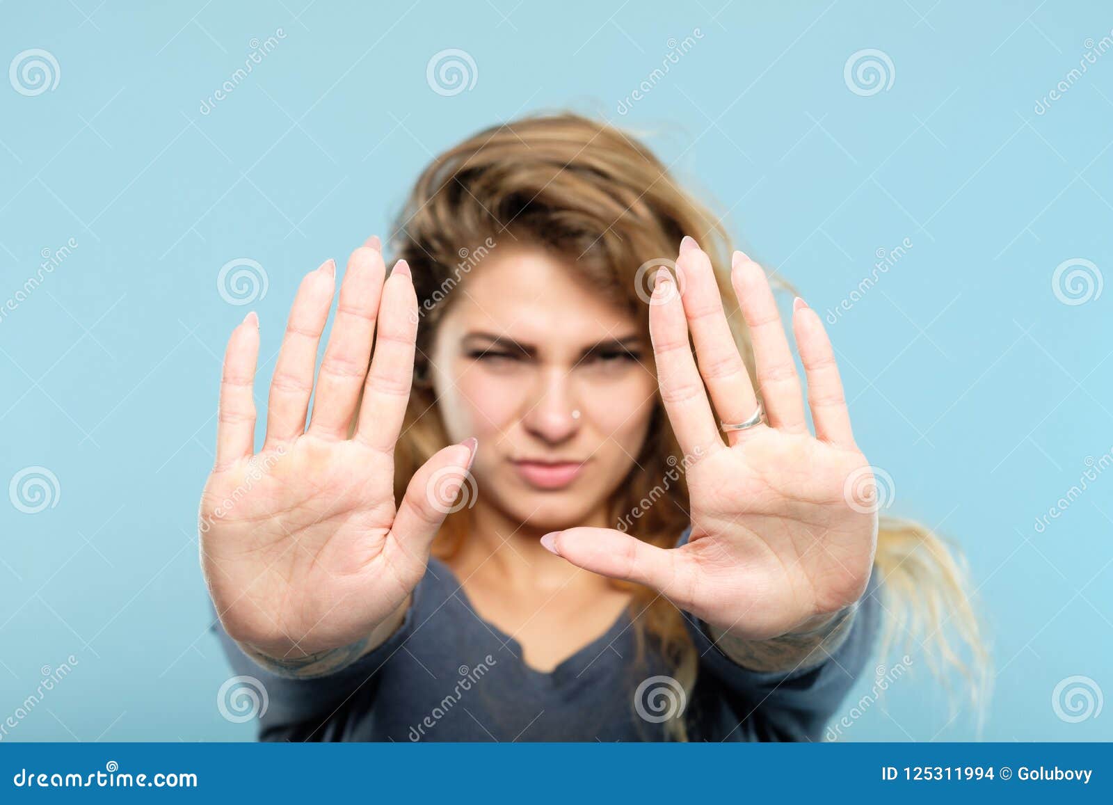 girl shutting out private life hands forward block