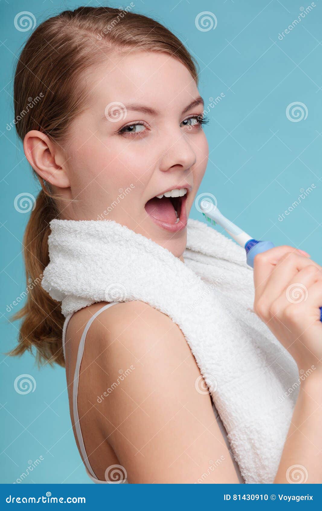 Girl Singing Using Toothbrush Stock