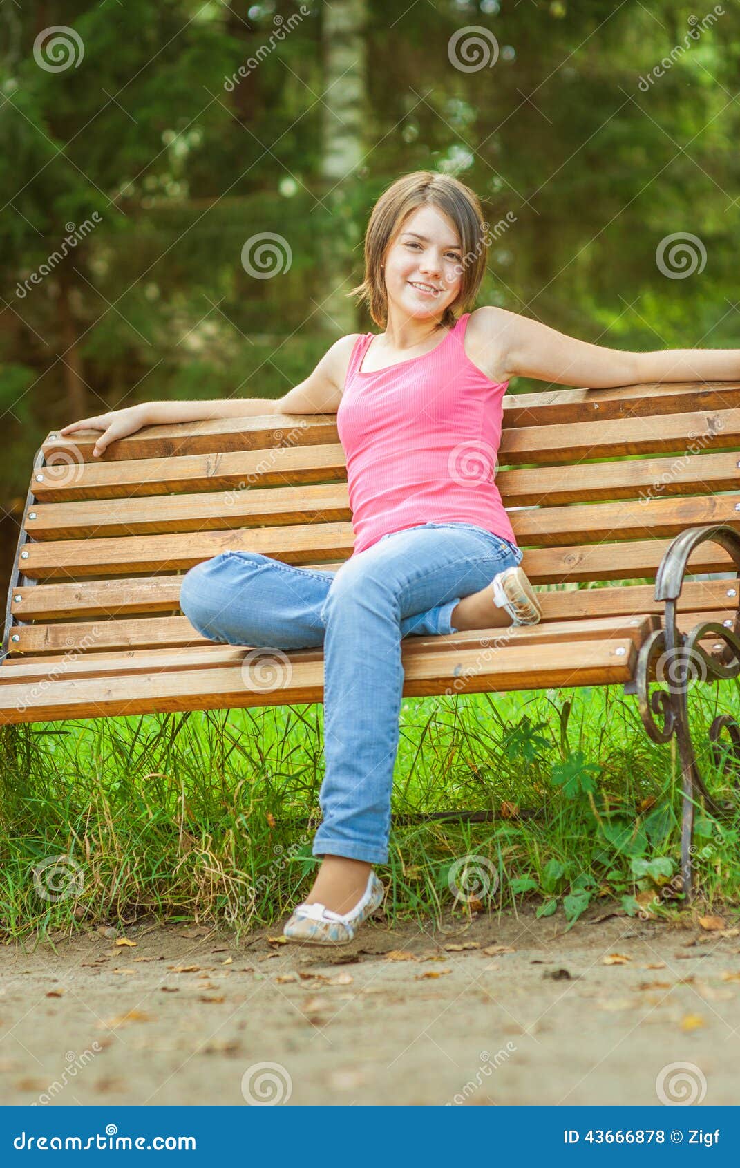 Girl sits on bench stock photo. Image of cheerful, american - 43666878