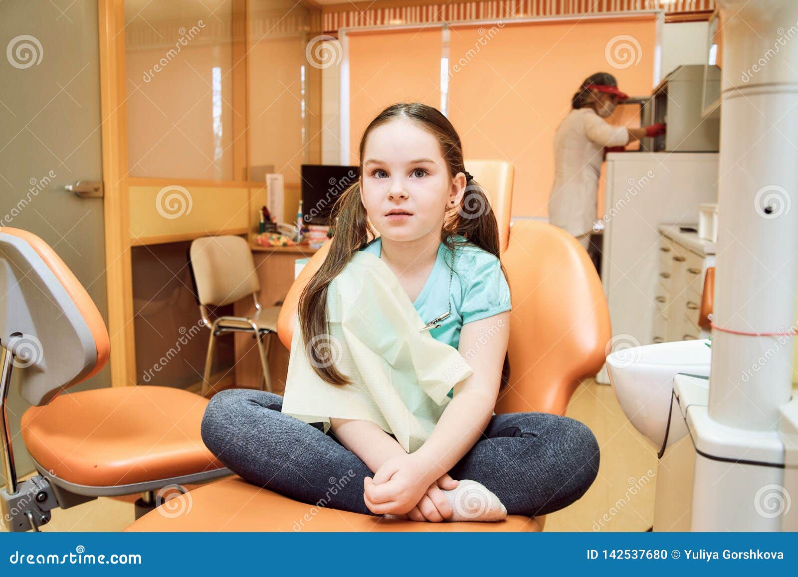 Pediatric Dentistry Girl Sitting On A Dental Chair Stock Photo Image