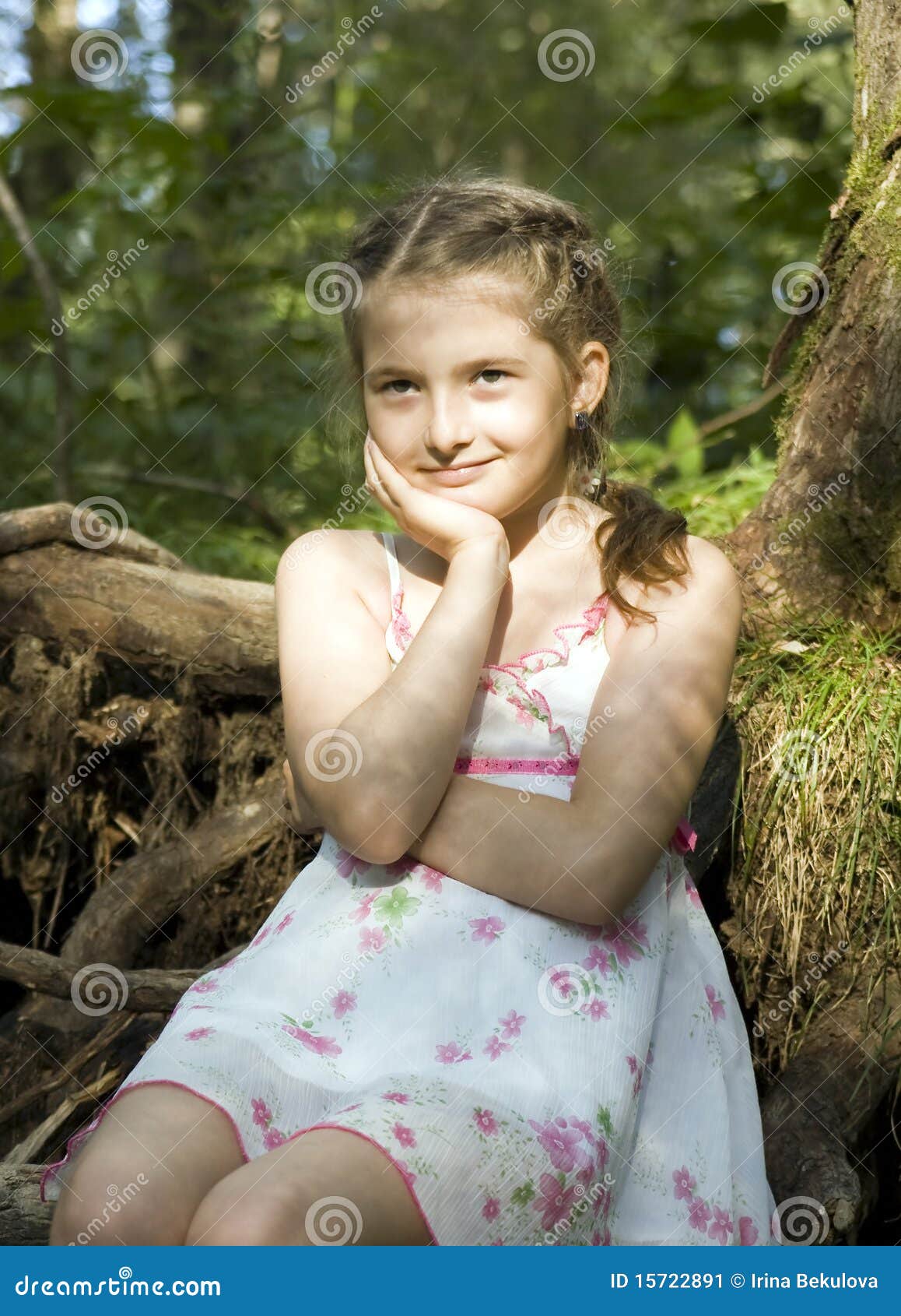 Girl sits in wood stock image. Image of attitude, child - 15722891