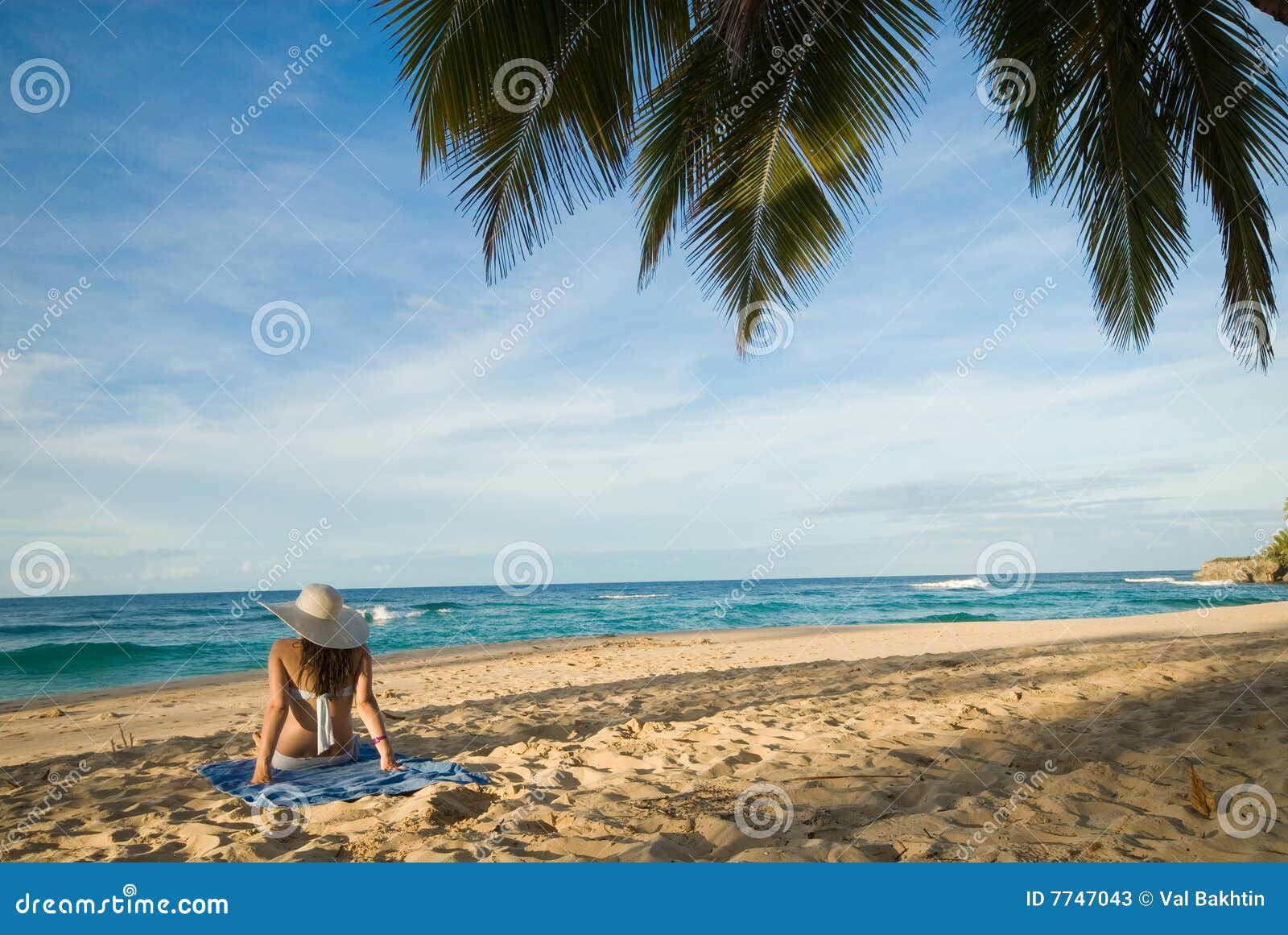 Girl sitting on the beach stock image. Image of vacation - 7747043