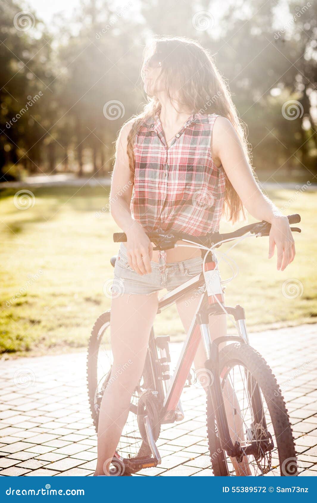 Girl sitting on bicycle stock photo. Image of lifestyle 55389572
