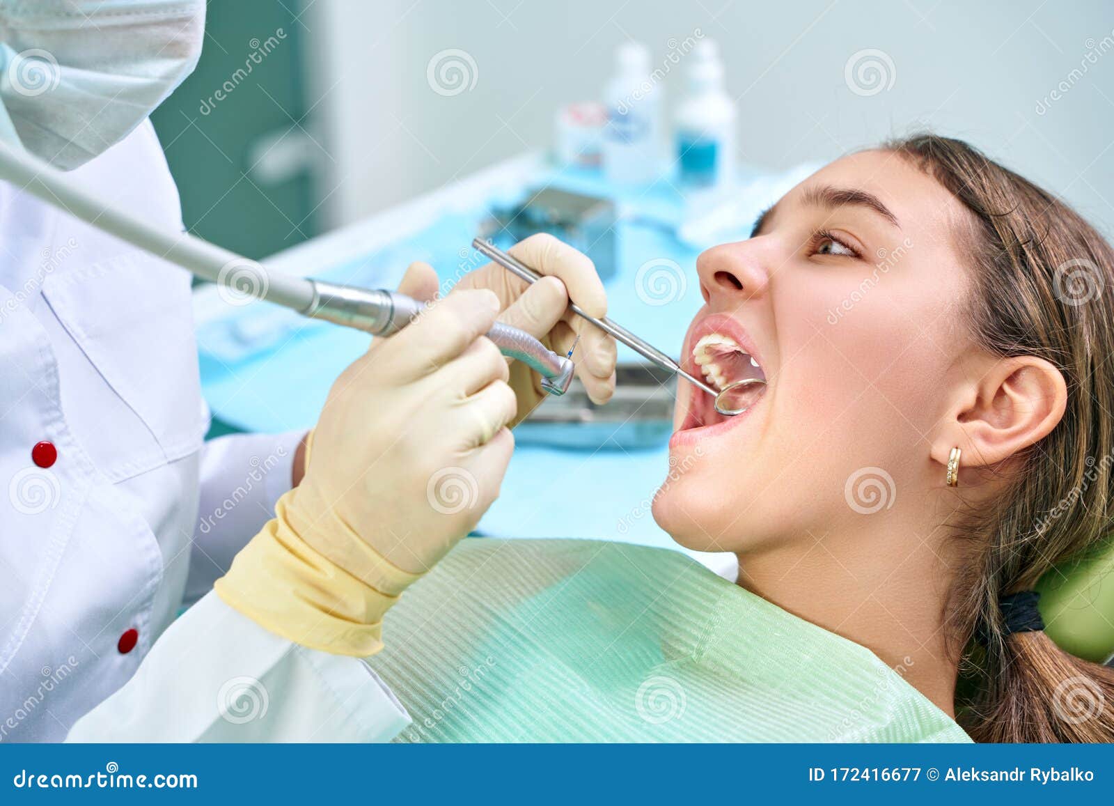 Girl Sitting at Dental Chair with Open Mouth during Oral Check Up while  Doctor. Visiting Dentist Office Stock Image - Image of hospital, assistant:  172416677