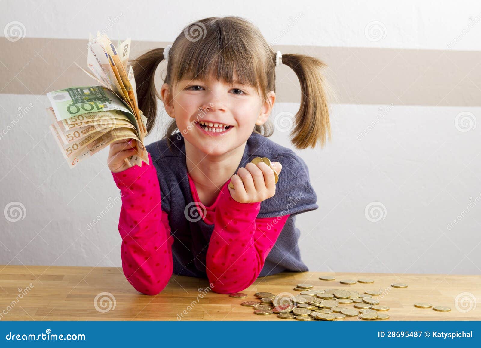 Girl Sitting In Front Of A Lot Of Money Stock Image Image Of Hand