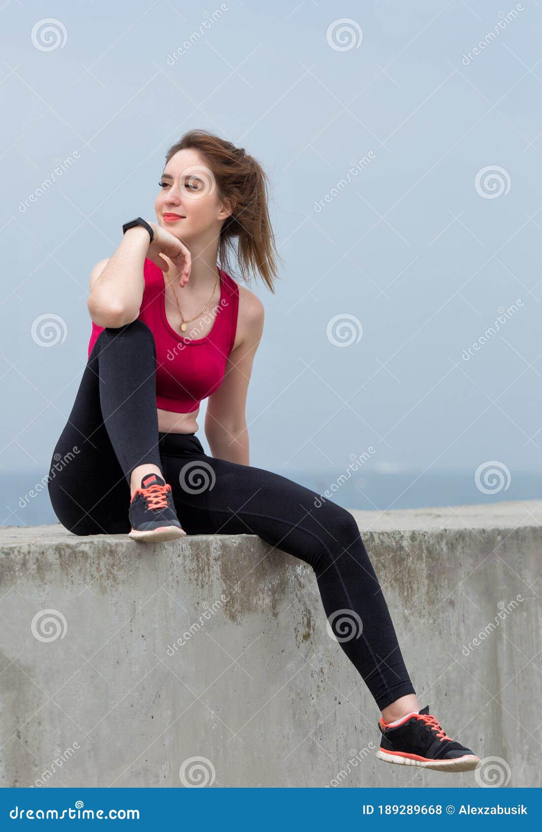 Sad Woman Resting Her Head On Her Knees Stock Photo 