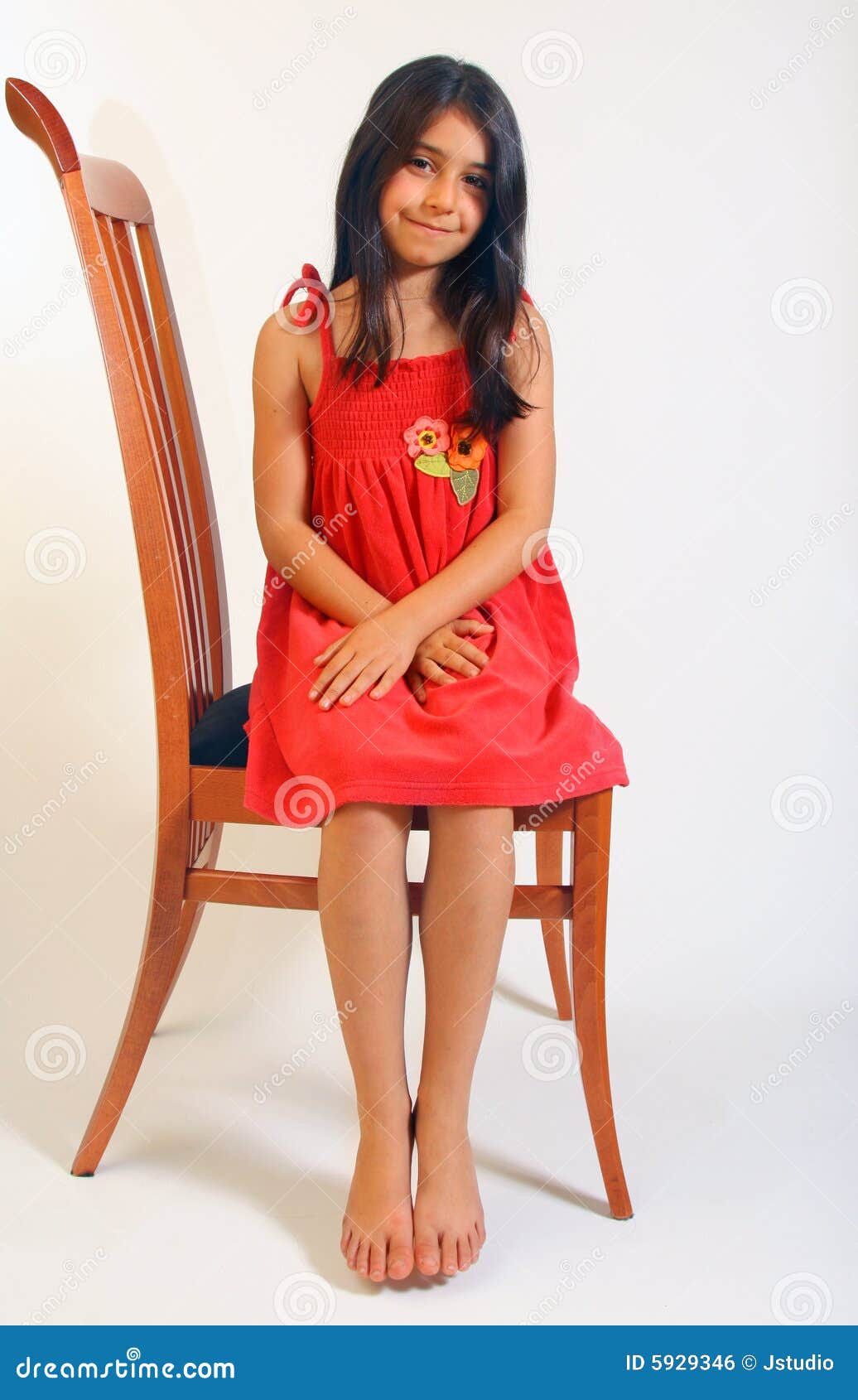 Girl sitting in red dress stock photo. Image of portrait 5929346