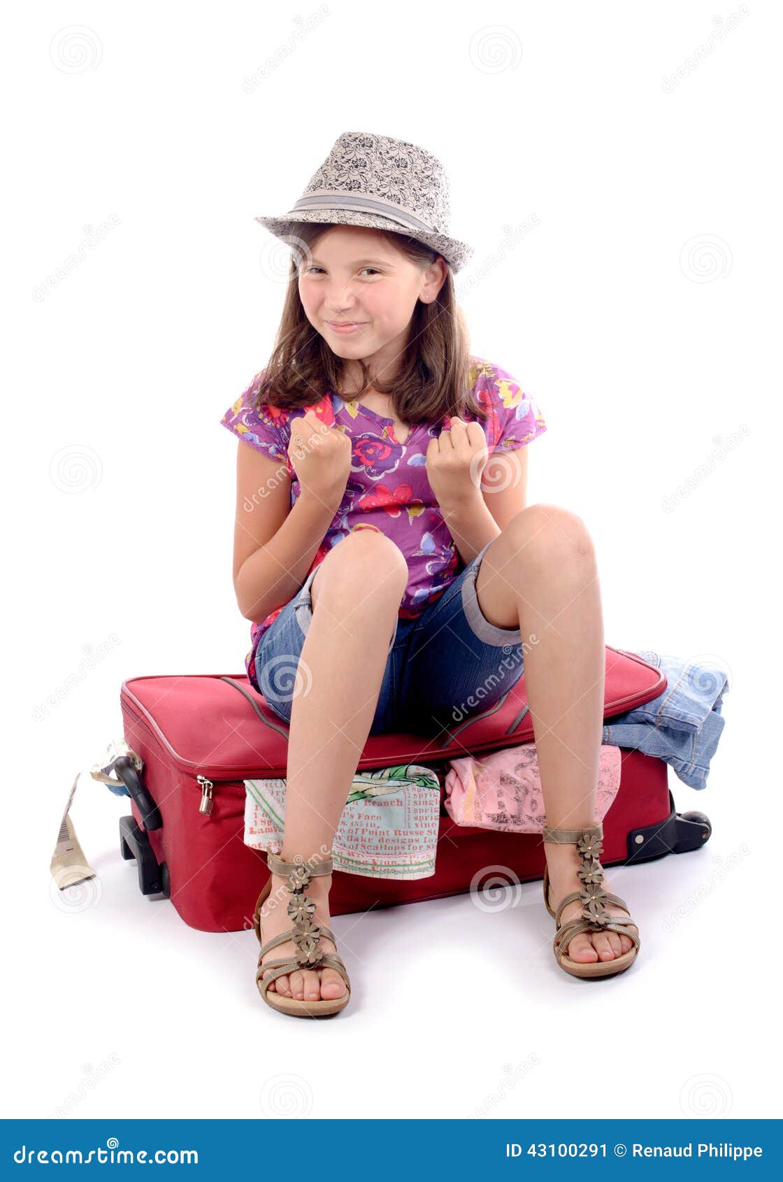 Girl sitting on a suitcase stock image. Image of holiday 43100291