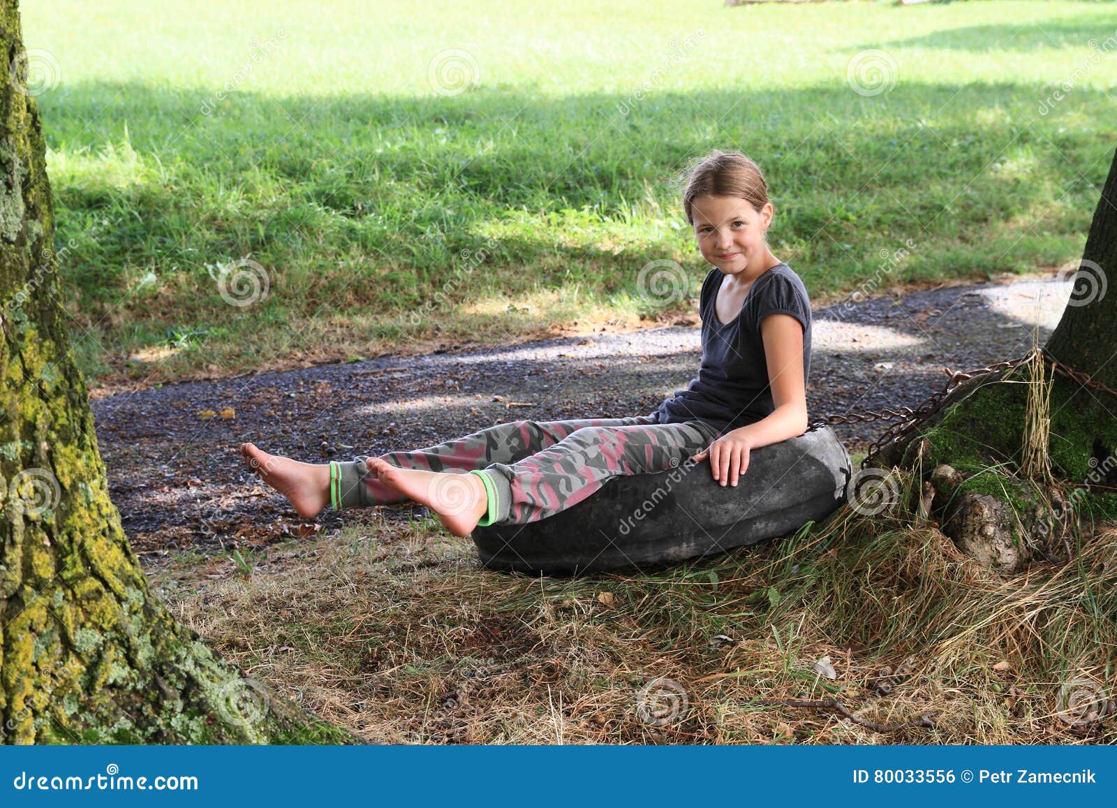 https://thumbs.dreamstime.com/z/girl-sitting-tire-barefoot-kid-young-smiling-old-asphalt-road-80033556.jpg