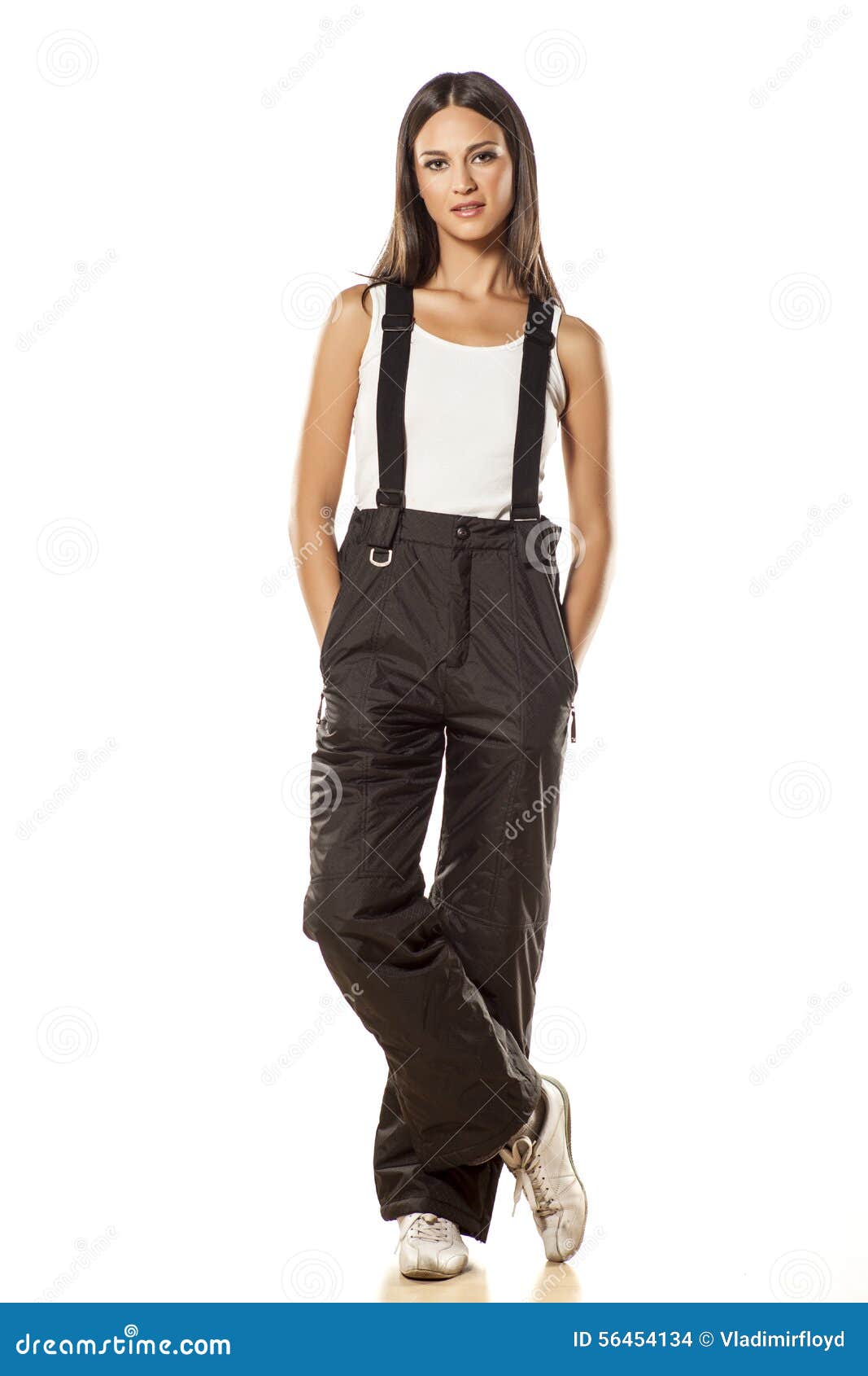 Girl in ski pants stock photo. Image of posing, person - 56454134