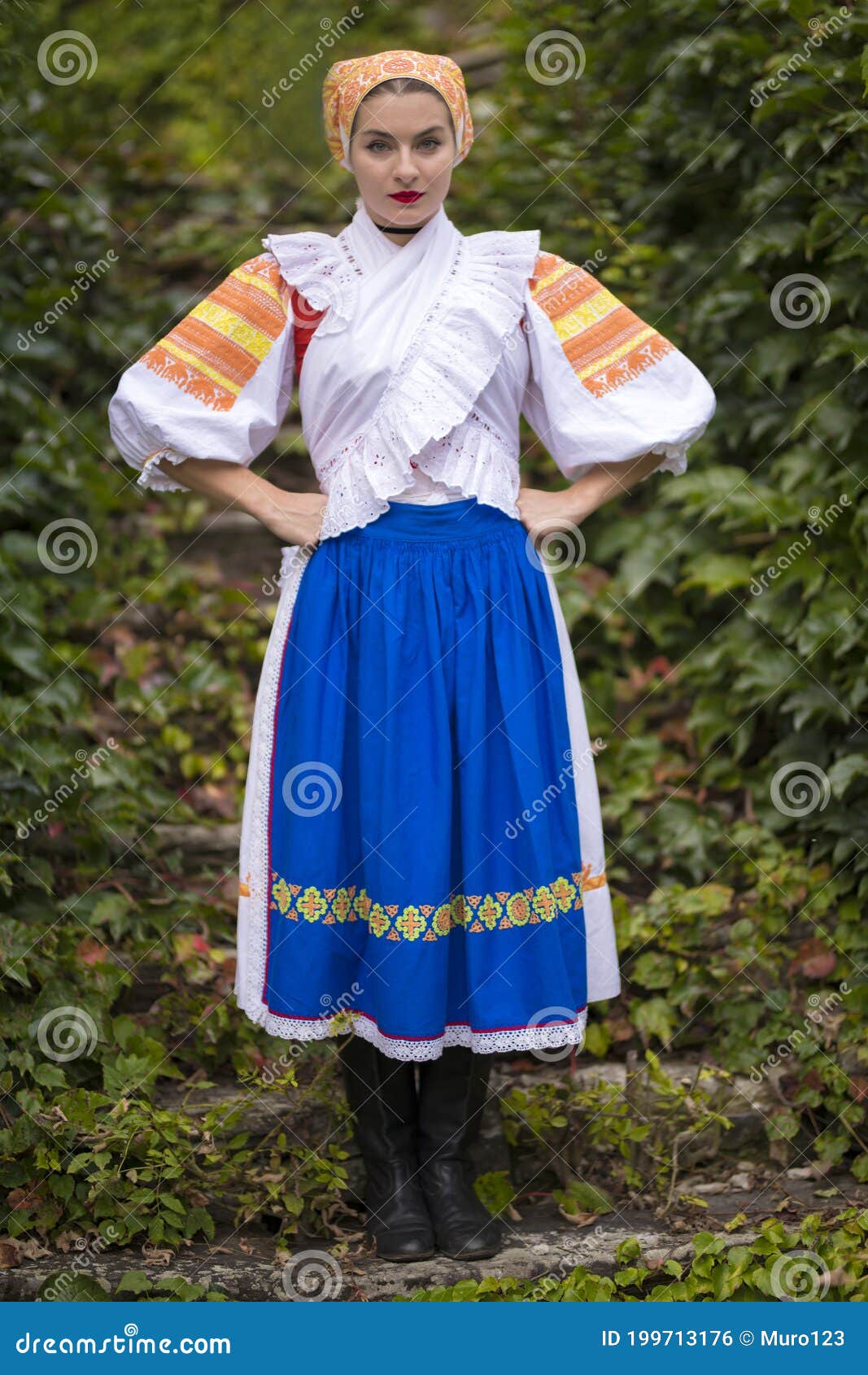 Girl in Slovak folk dress stock photo. Image of expression - 199713176