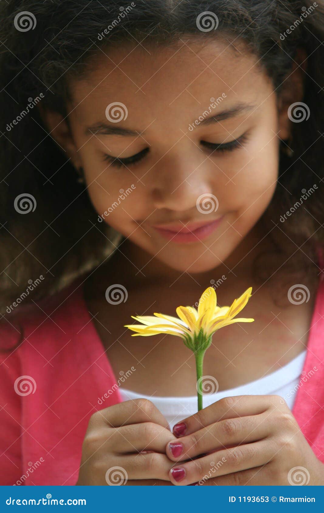 Girl Smelling Flowers stock image. Image of petals, girls 1193653