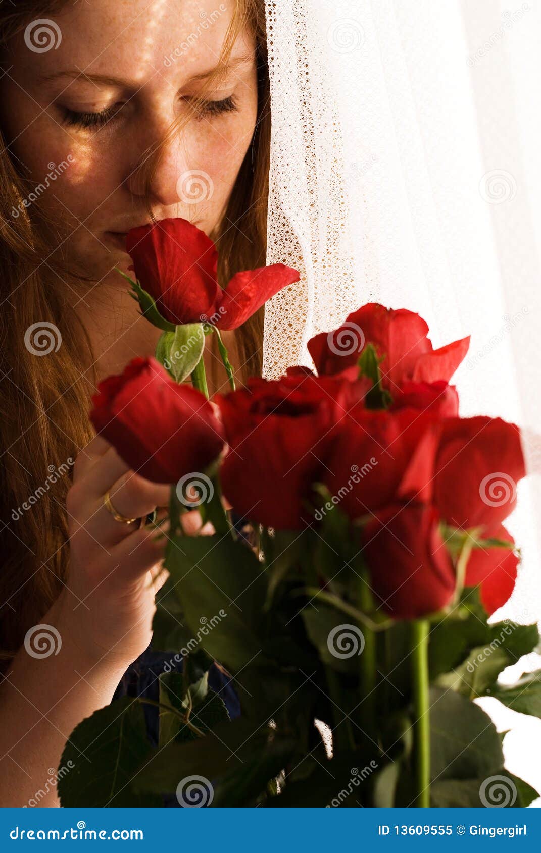 Girl smelling red roses stock image. Image of plant, bouqete 13609555