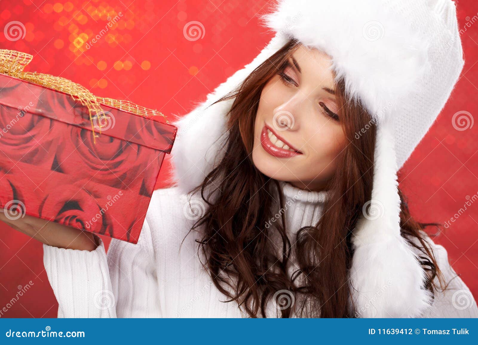 Girl Smiles and Holding a Gift in Packing Stock Photo Image of