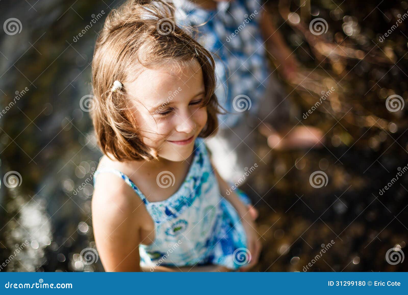Girl smiling in the sun stock photo. Image of brother - 31299180