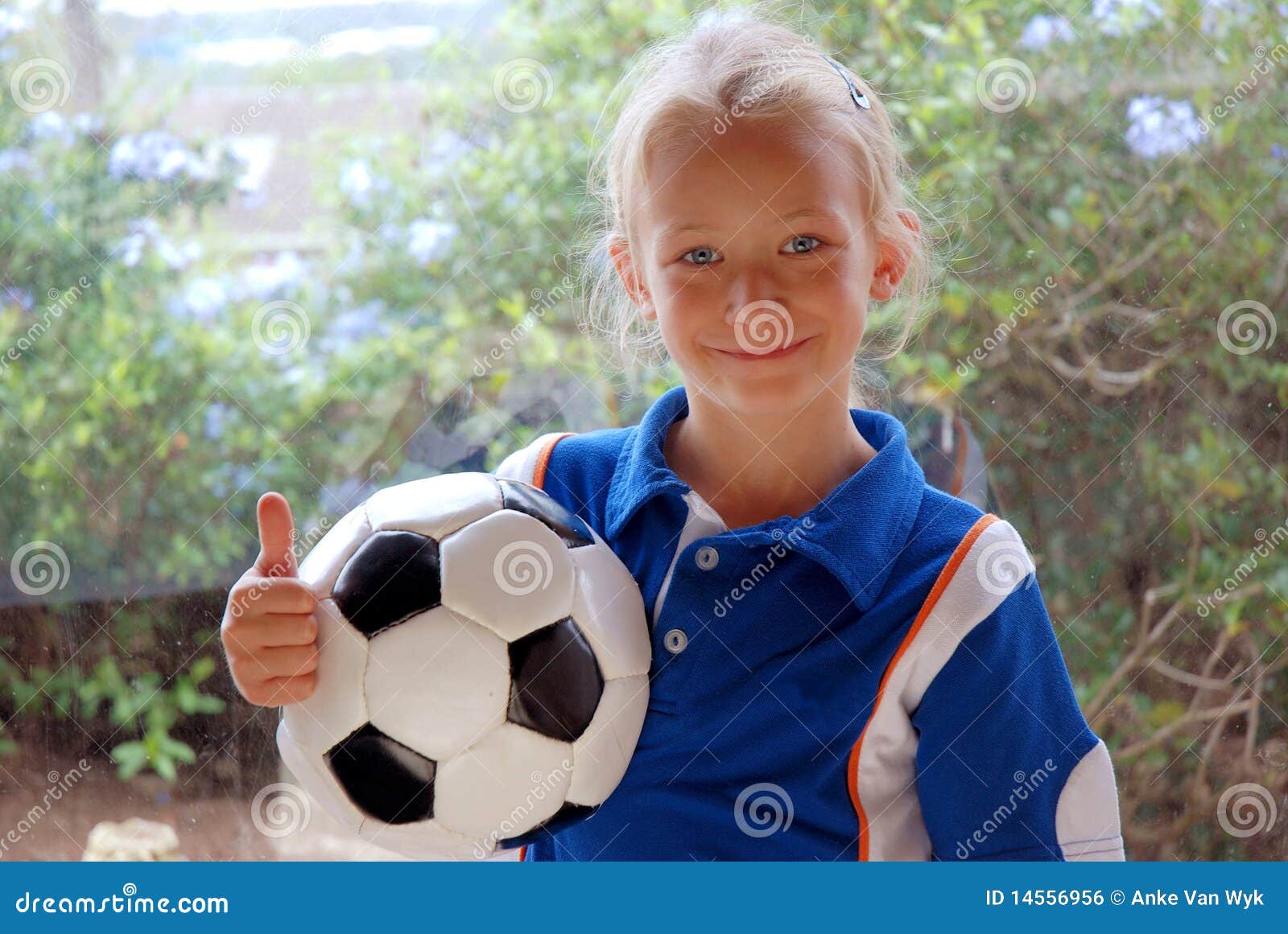 Girl with soccer ball stock photo. Image of child, white 14556956