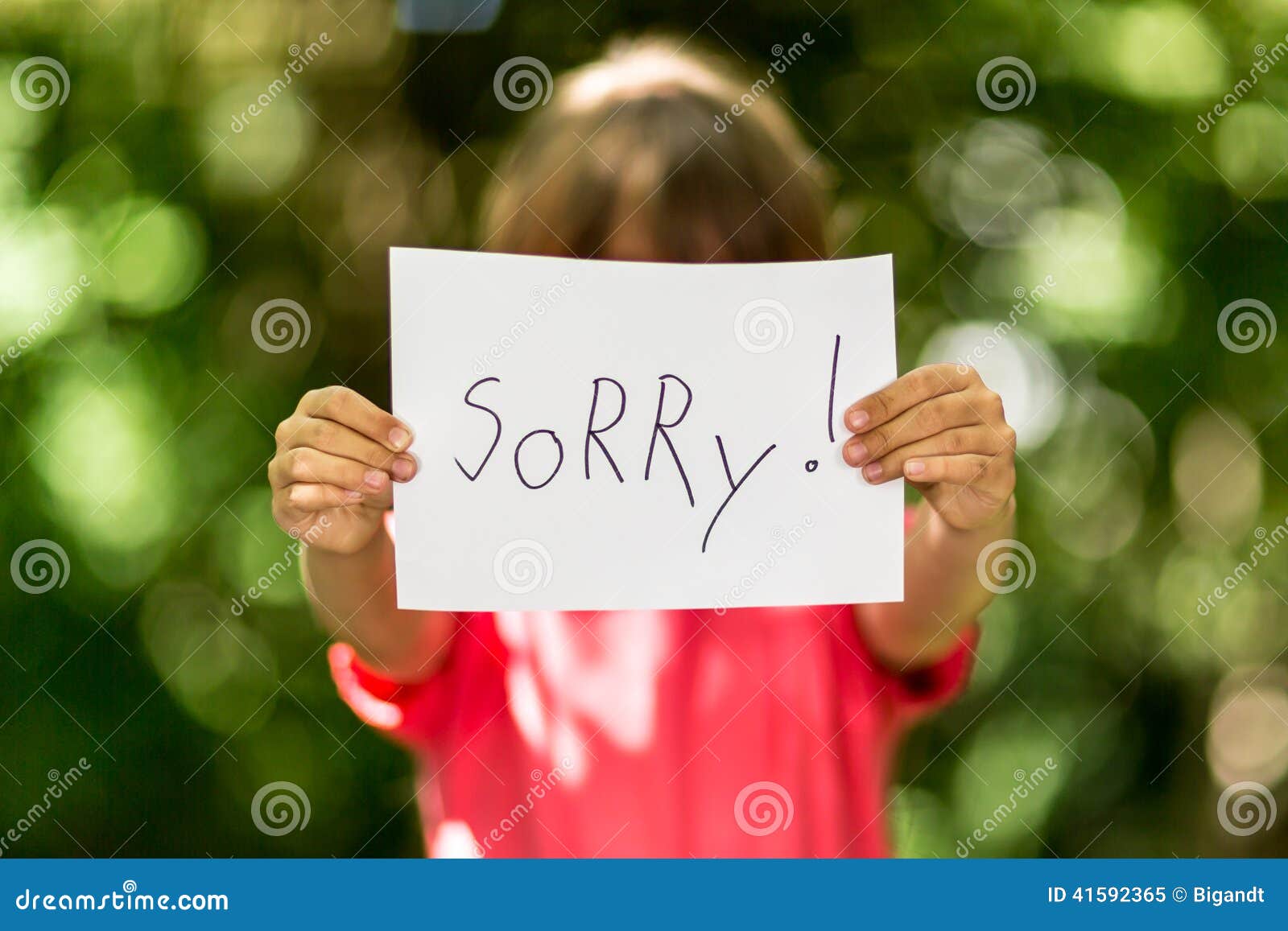Girl with Sorry sign stock image. Image of anonymous - 41592365