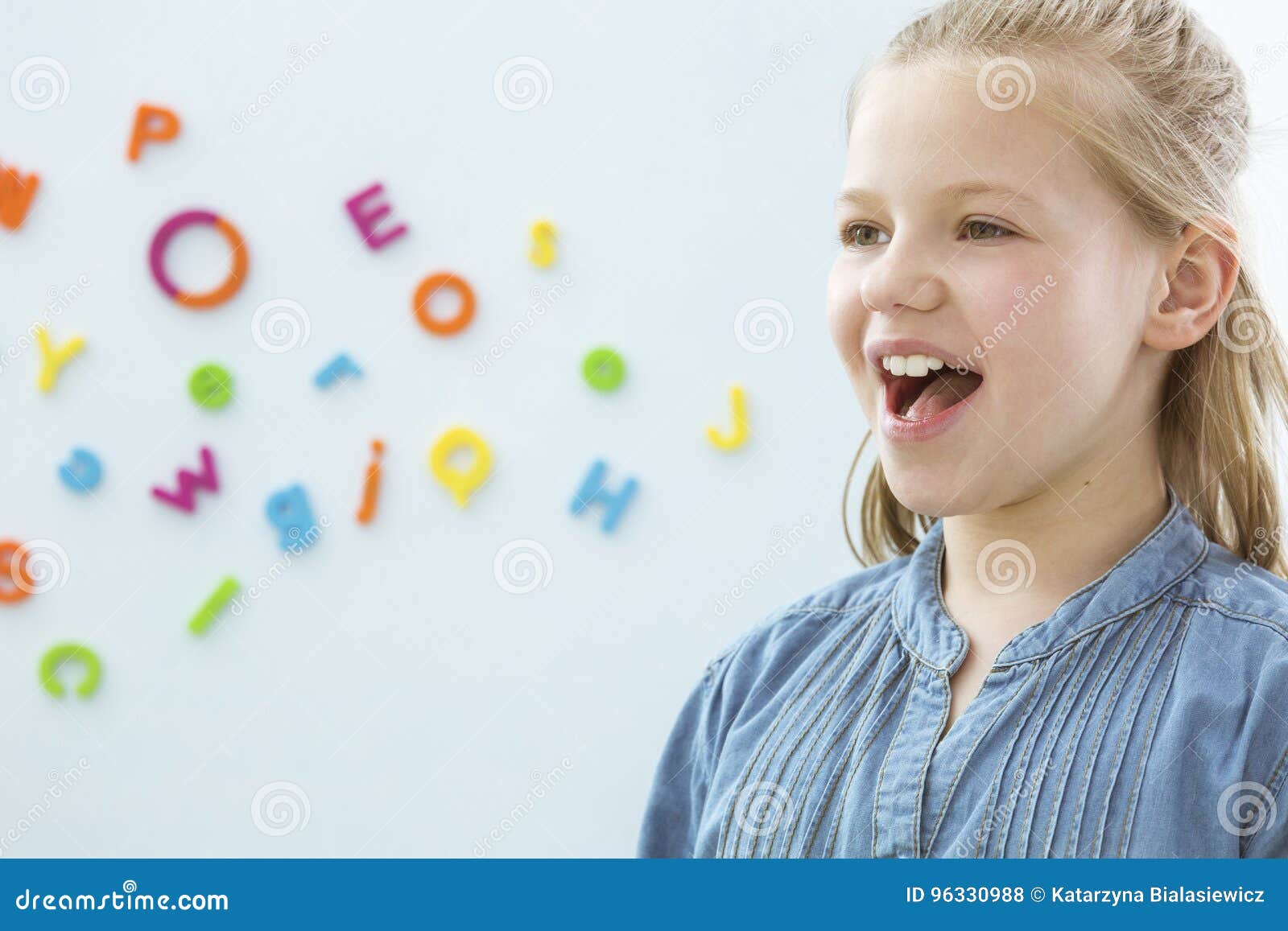 girl in speech therapy office