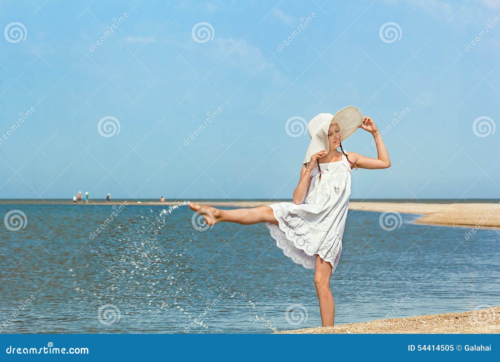 Girl Splashing Water on the Beach Stock Image - Image of recreation ...