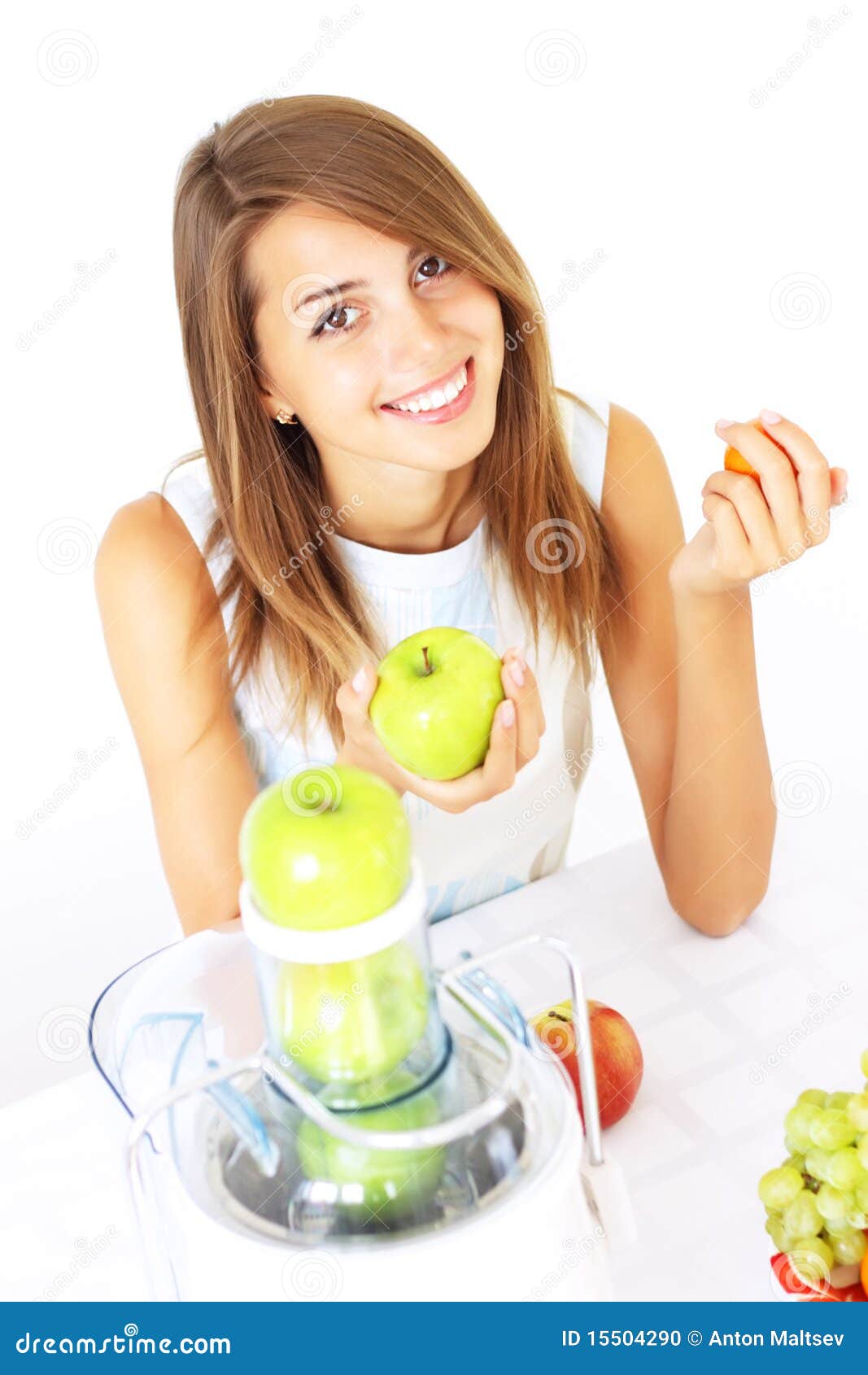 Girl Squeezes the Juice from the Juicer Stock Photo Image of color