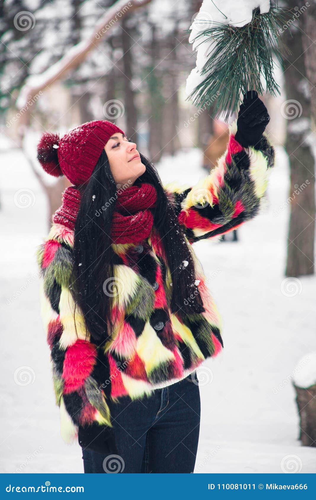 The Girl is Standing Under a Spruce Branch Stock Image - Image of ...