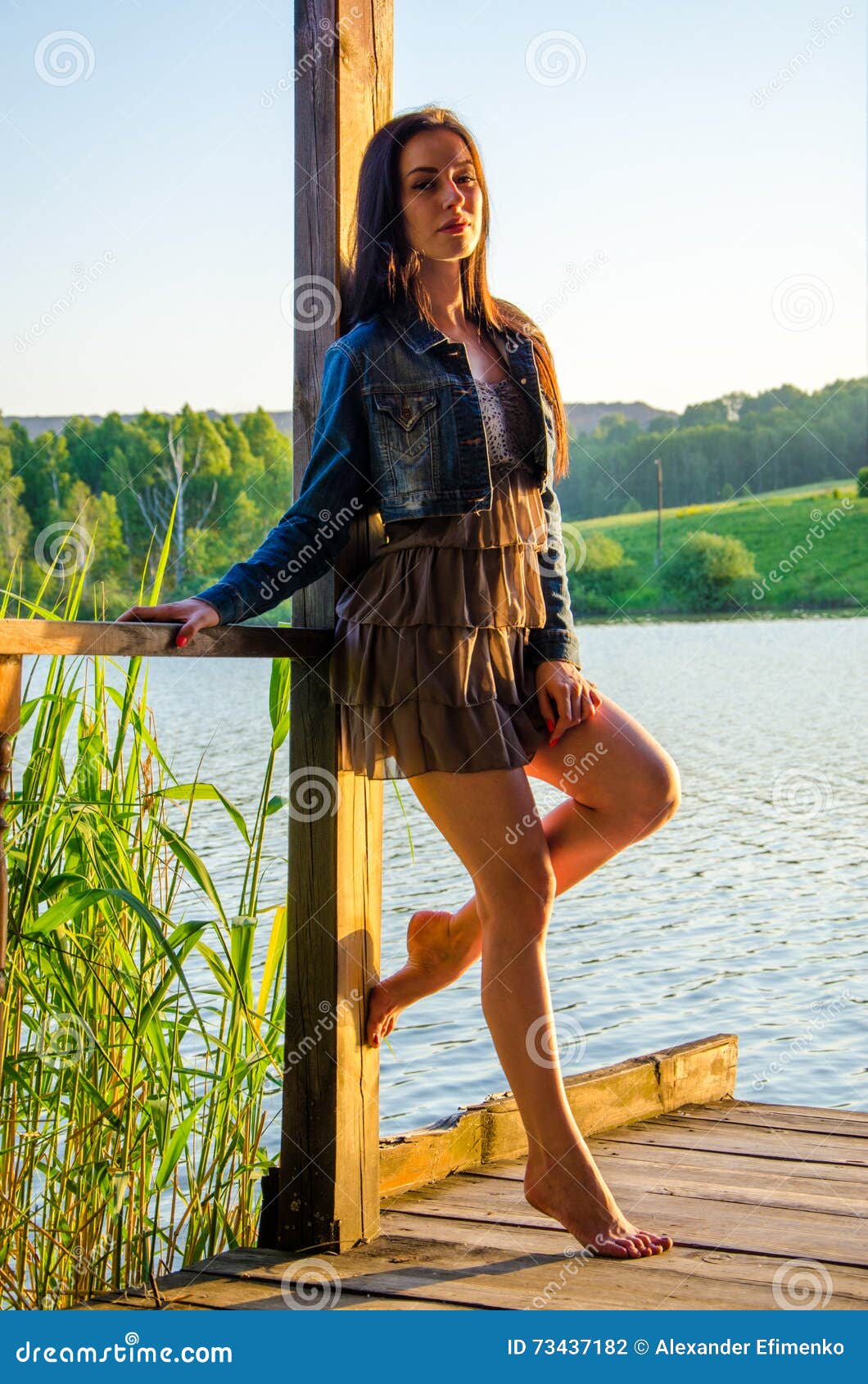 Beautiful Tall Brunette Woman On The Beach Stock