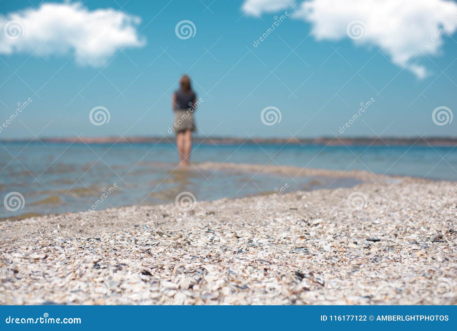 A Girl Stands On The Edge Of A Sea Beach Stock Photo Image Of Edge