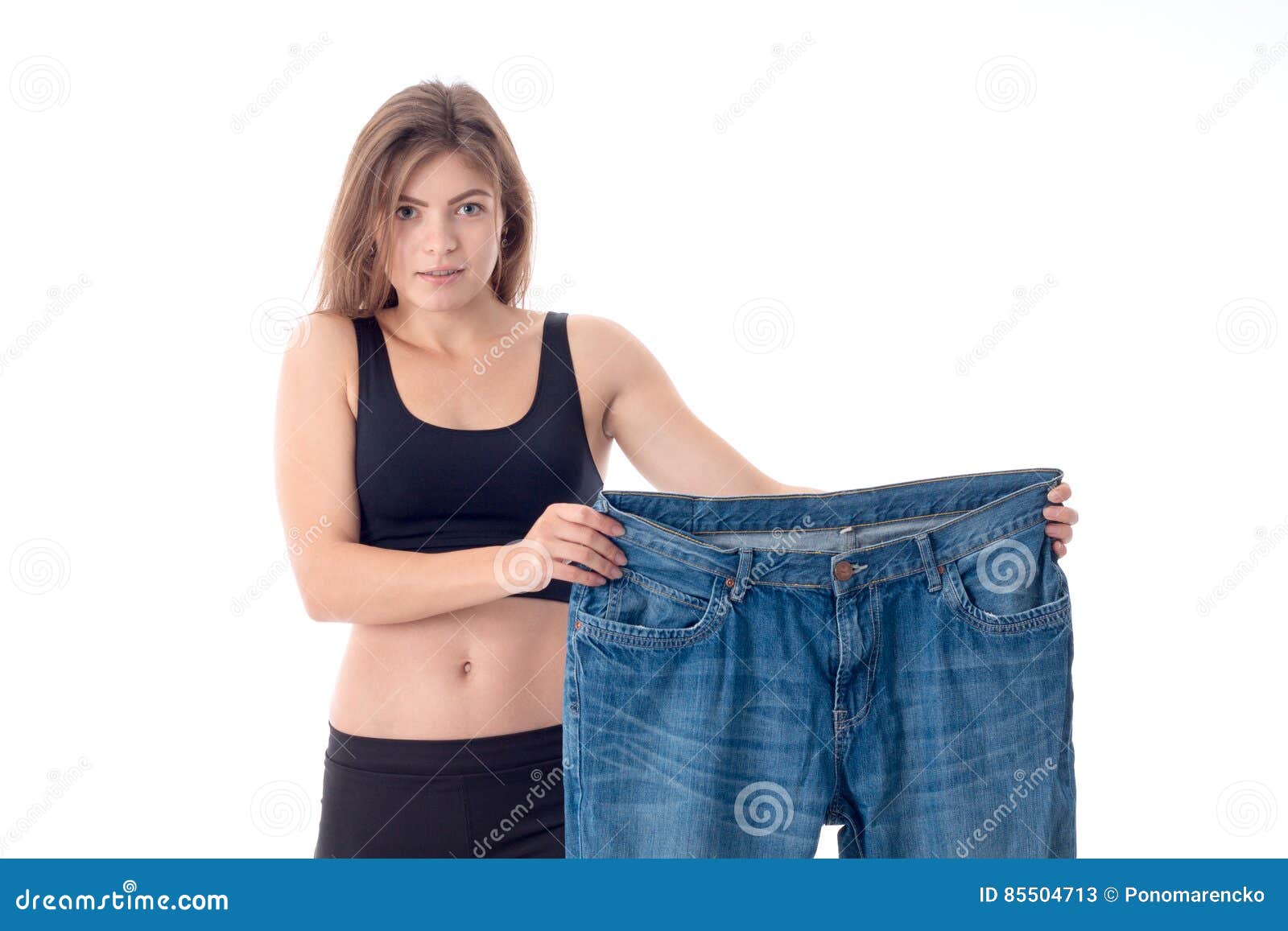 Girl Stands and Holding a Big Wide Pants Stock Image - Image of belly ...