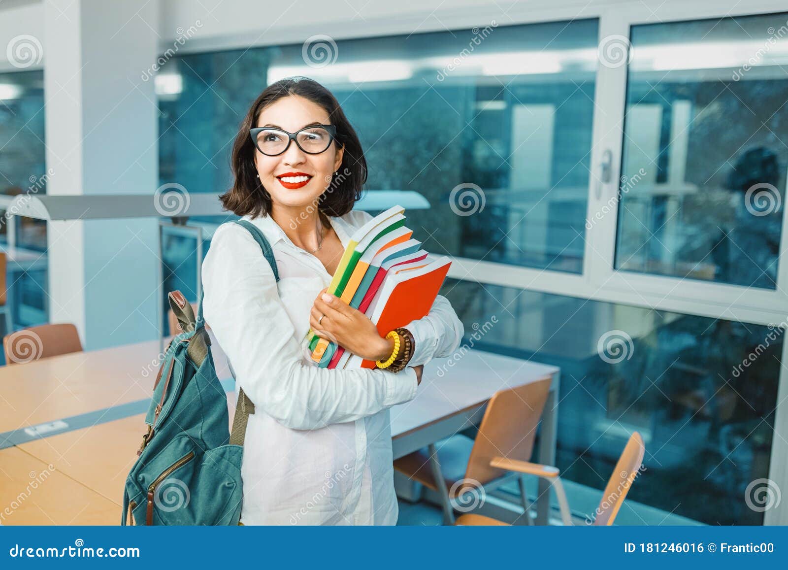 student with work books in the classroom for lectures at the university. concept of teaching and learning