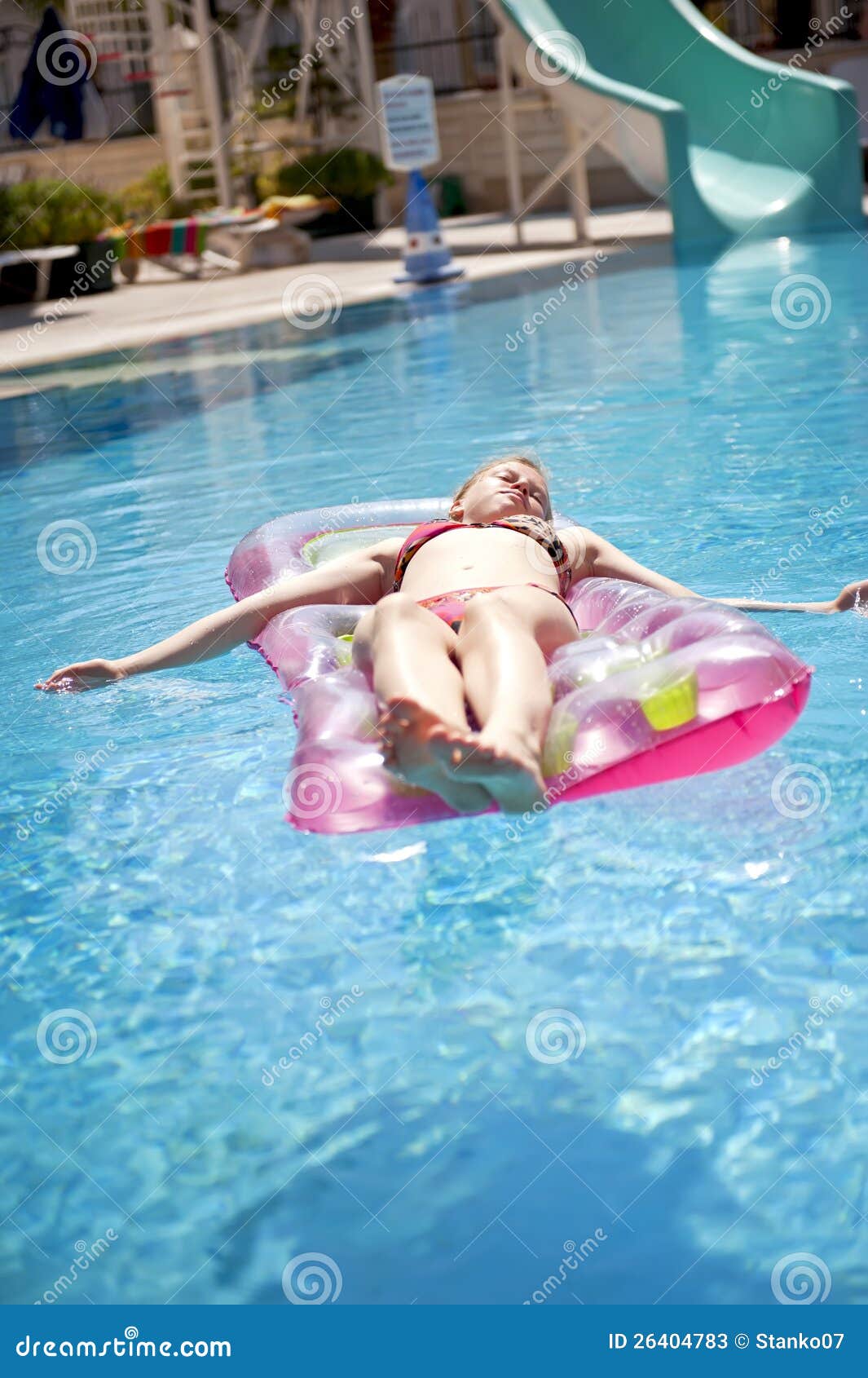 girl sunbathing on a mattress