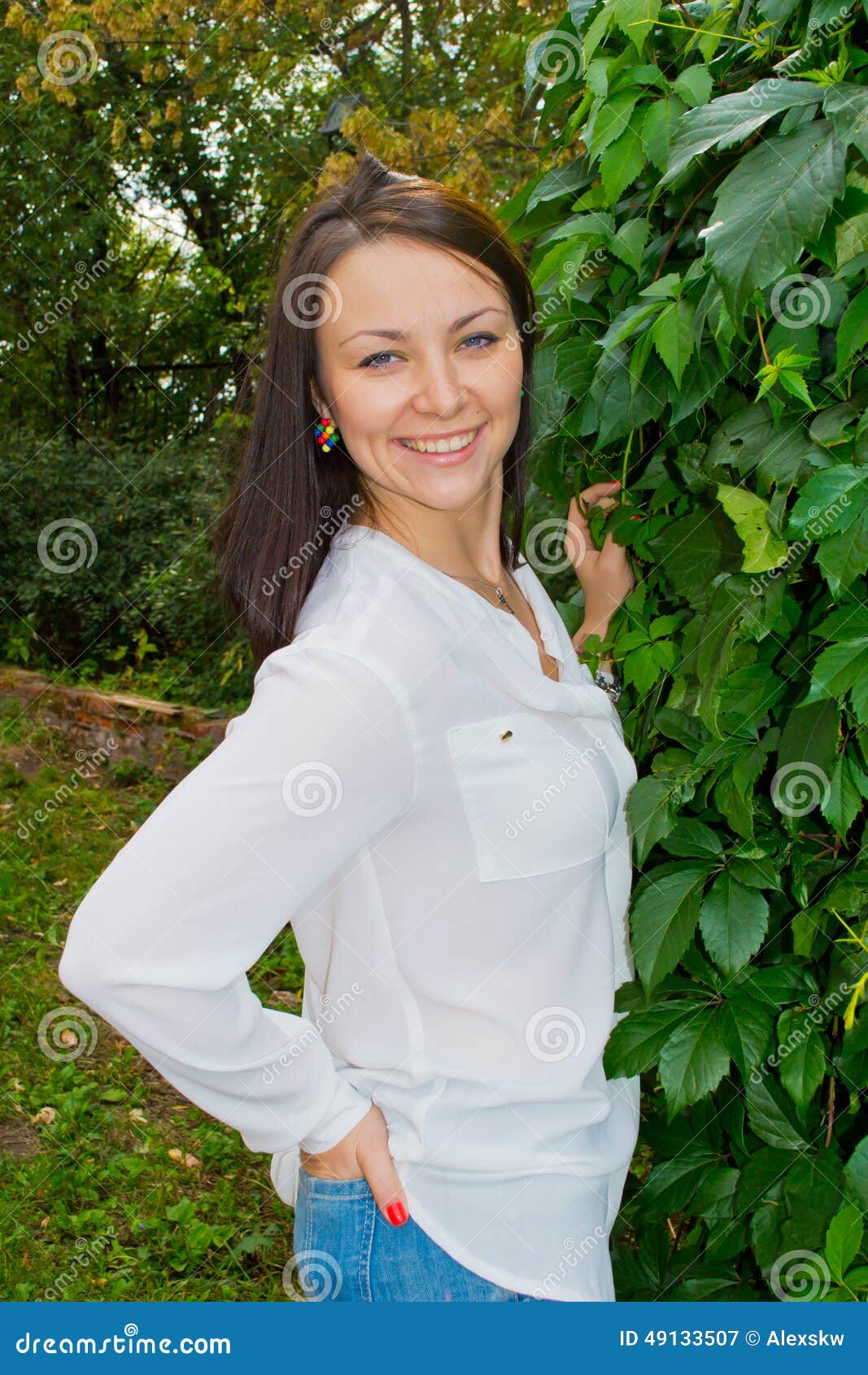 Girl Surrounded by Greenery Stock Image - Image of carefree, easy: 49133507