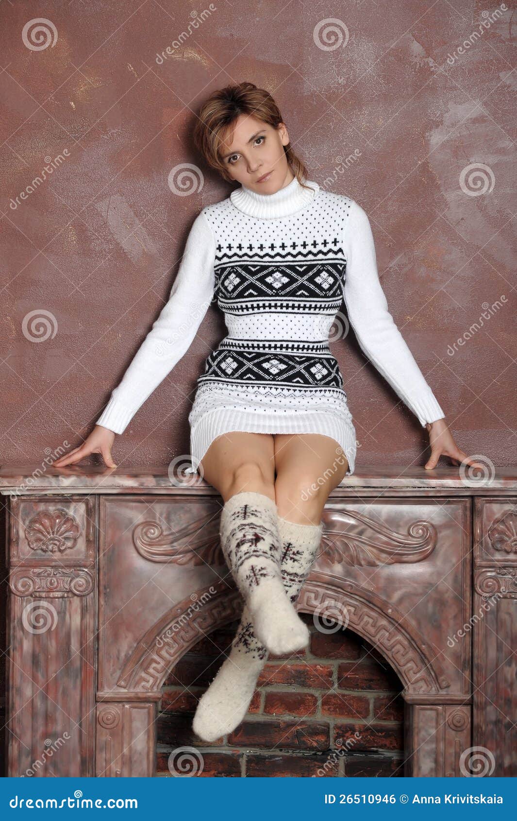 Girl In A Sweater And Socks Stock Photo - Image: 26510946