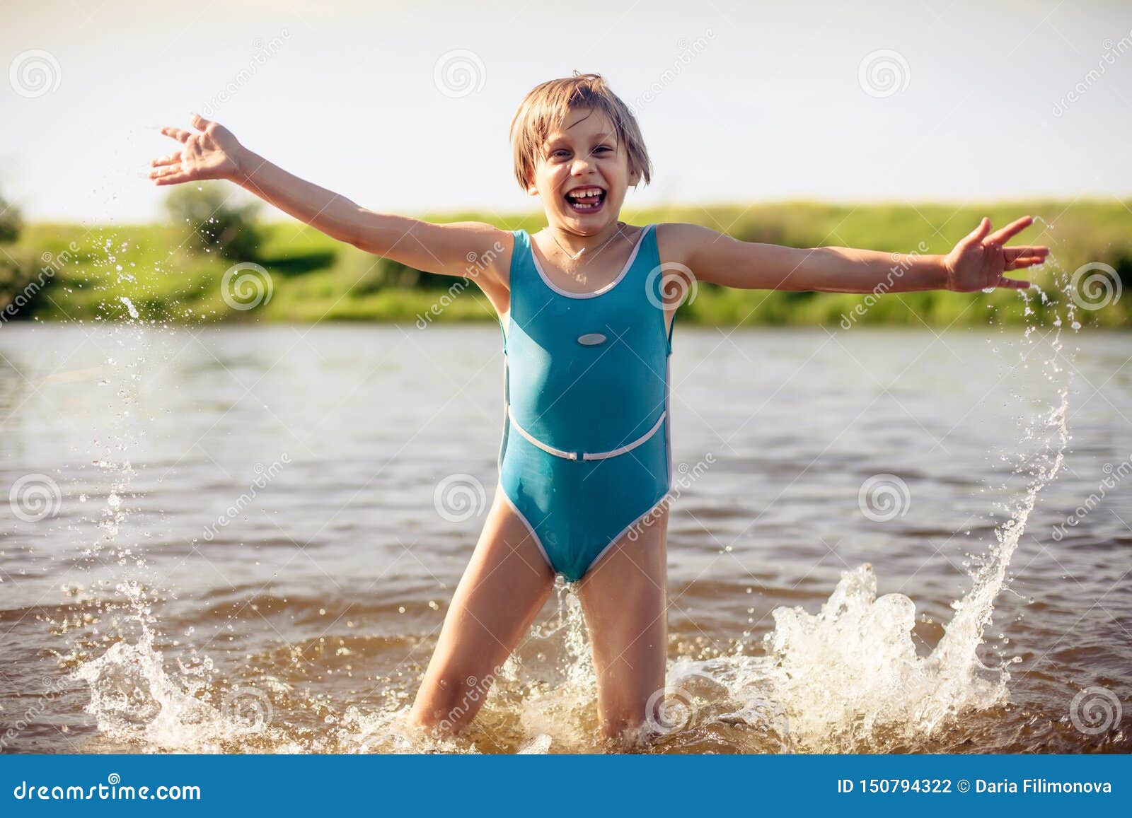 Girl swimming in river stock photo. Image of holiday 150794322