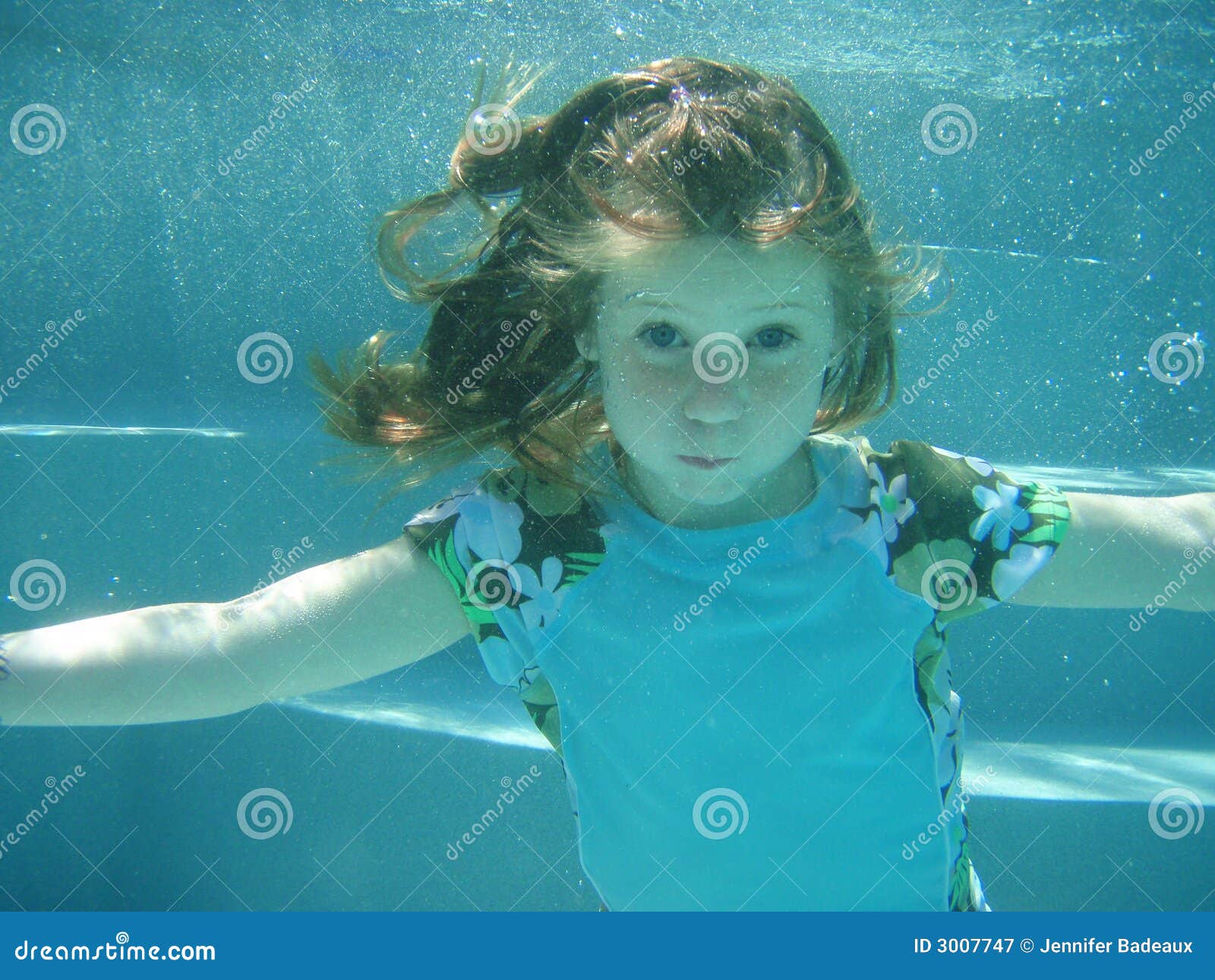 Girls Swimming Underwater