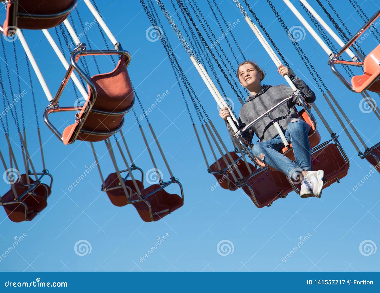 The Girl on the Swing. Attraction in the Park Stock Image - Image of