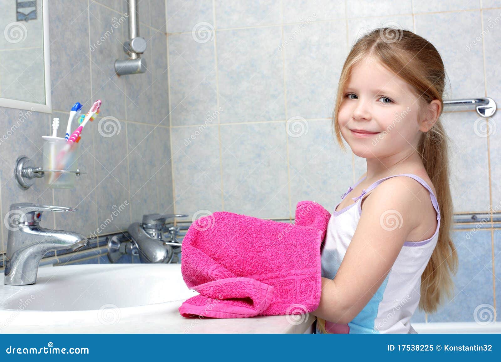 girl taken towel in bathroom