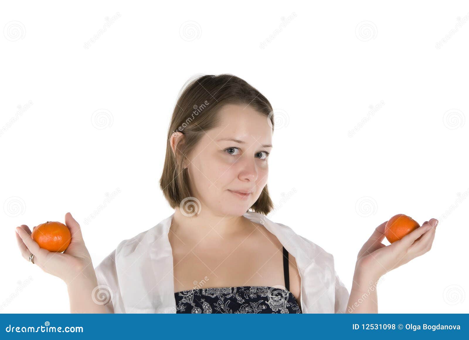 Girl with tangerines stock photo. Image of holds, white 12531098