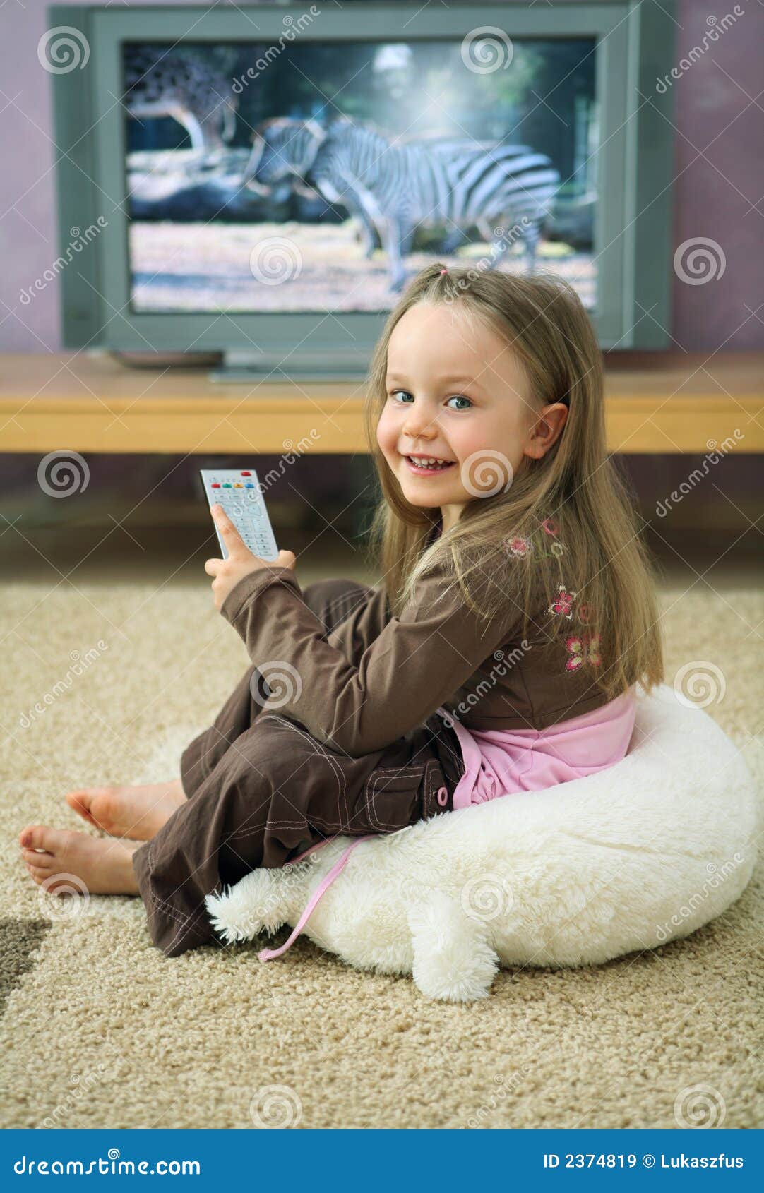 Girl at Television stock image. Image of happy, girl, innocent 2374819