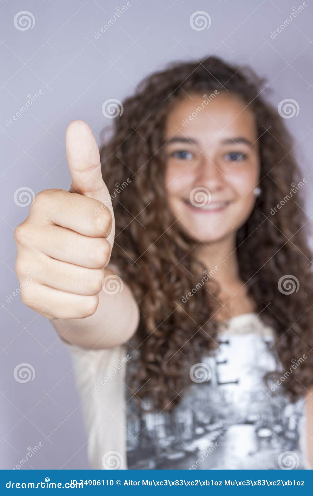 girl with thumbs up, happy and successful