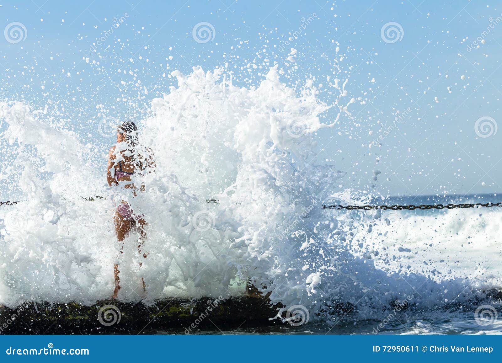 girl stepping into the waves girl stepping into the waves
