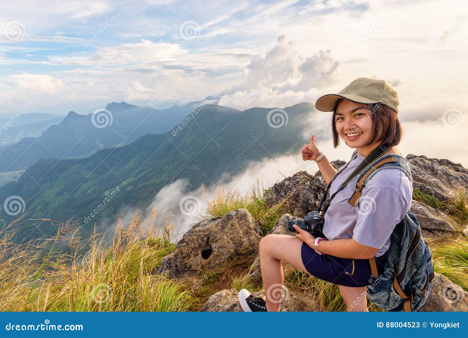 Female Wanderer Poses on Top of the Rock Stock Photo - Image of seaside,  backpacker: 154986976