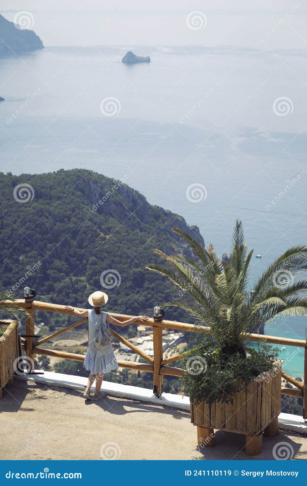 girl tourist stands on the observation deck