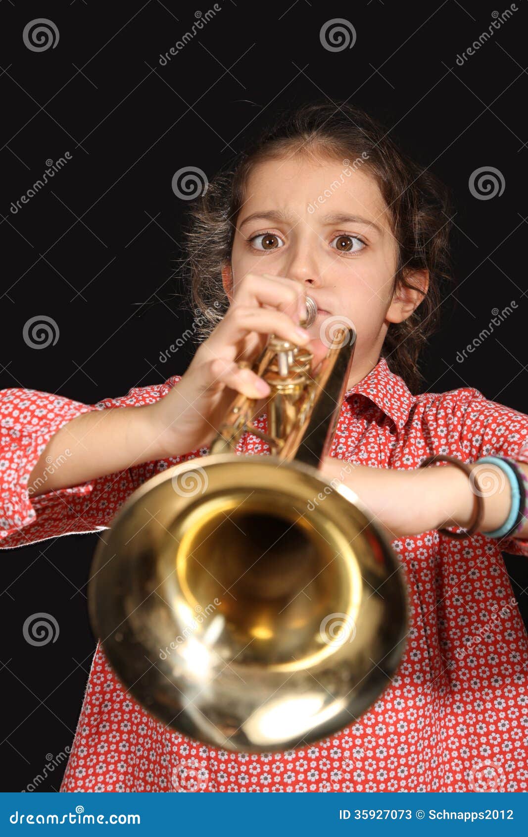 Girl playing trumpet into microphone - Stock Image - F005/1164 - Science  Photo Library